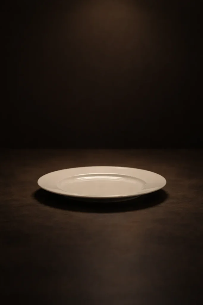 Minimal plate on dark table representing Final Thoughts in a dinner party