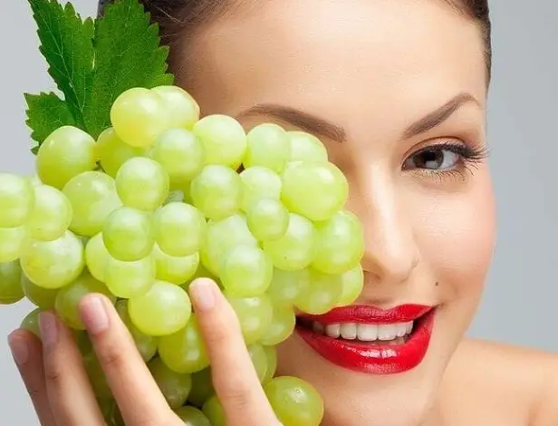 Rubbing Grapes on Skin